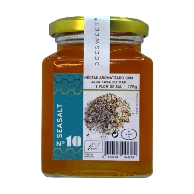 Frasco de vidro de néctar aromatizado com rótulo azul e branco