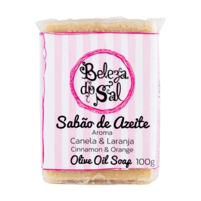 Sabão de azeite com embalagem rosa e branca com texto