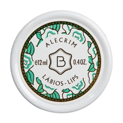 Embalagem redonda branca de bálsamo labial com decoração floral e texto informativo