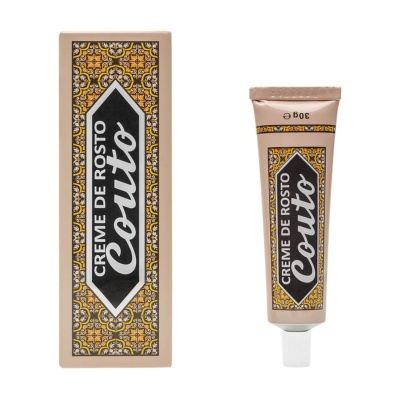 Creme facial Couto, embalagem com padrão amarelo e texto preto e branco