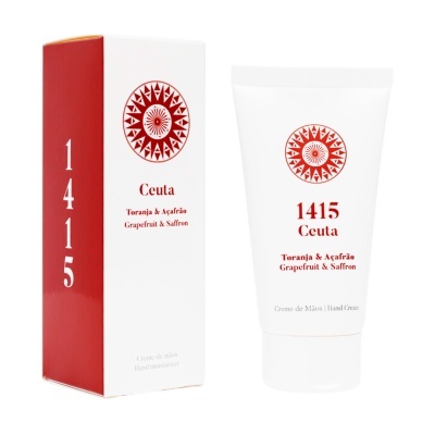 Creme de mãos 1415 Ceuta Toranja & Açafrão em tubo branco com caixa branca e vermelha.
