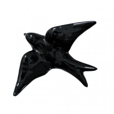 Escultura de pássaro preta com acabamento brilhante