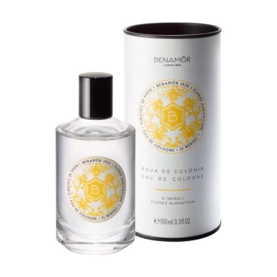 Frasco de água de colónia e embalagem cilíndrica da Benamôr com design amarelo e preto