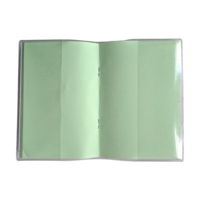 Livro ou agenda verde claro aberto