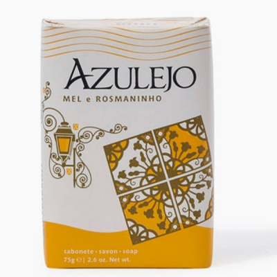 Sabonete em embalagem branca e amarelo com padrão de azulejo e texto AZULEJO