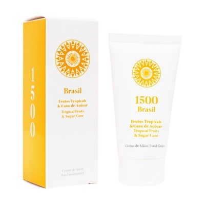 Creme de mãos com embalagem branca e amarela, texto em amarelo e símbolo central.