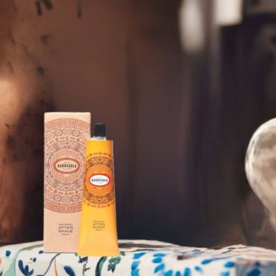 Bálsamo after shave Antiga Barbearia de Bairro com embalagem e tubo amarelos e castanhos