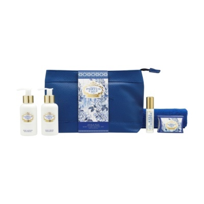 Conjunto de viagem PORTUS CALE com bolsa azul e produtos de cuidado pessoal.