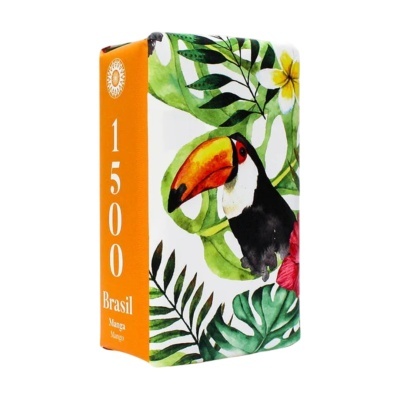 Embalagem de chá laranja com tucano e folhas tropicais coloridas