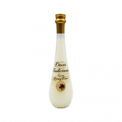 Garrafa de licor branco com tampa dourada e etiqueta dourada