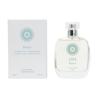 Frasco de perfume e caixa branca com texto