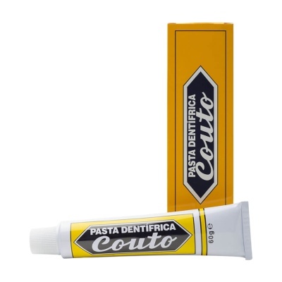 Tubo e caixa de pasta dentífrica Couto com design amarelo e preto
