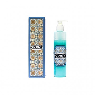 Frasco de champô azul com caixa decorada com padrão de azulejos