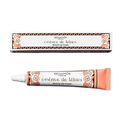 Embalagem e tubo de creme de lábios BENAMÔR com decoração floral laranja e texto em dourado e preto