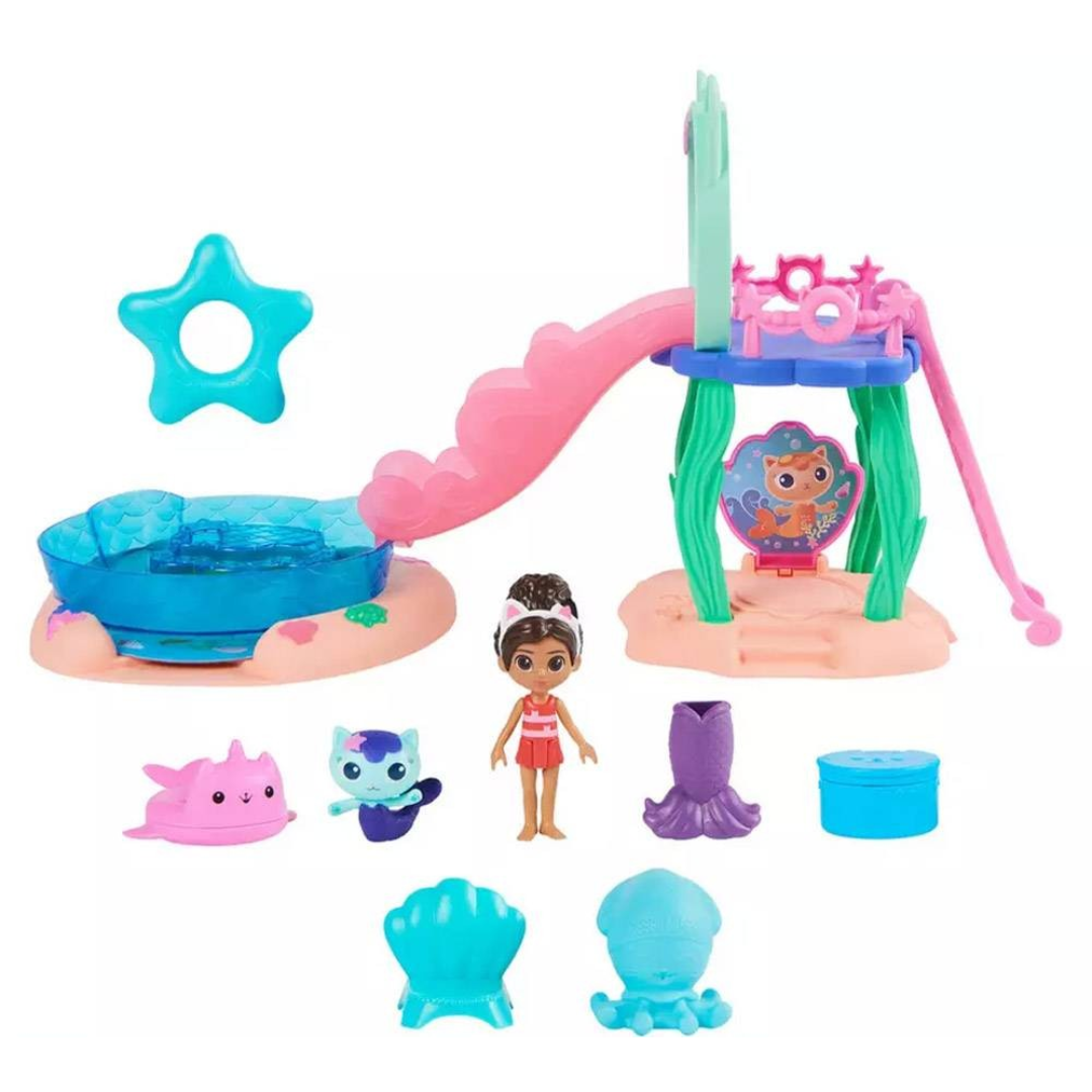 Brinquedo infantil com escorrega rosa, piscina azul, boneca e acessórios coloridos