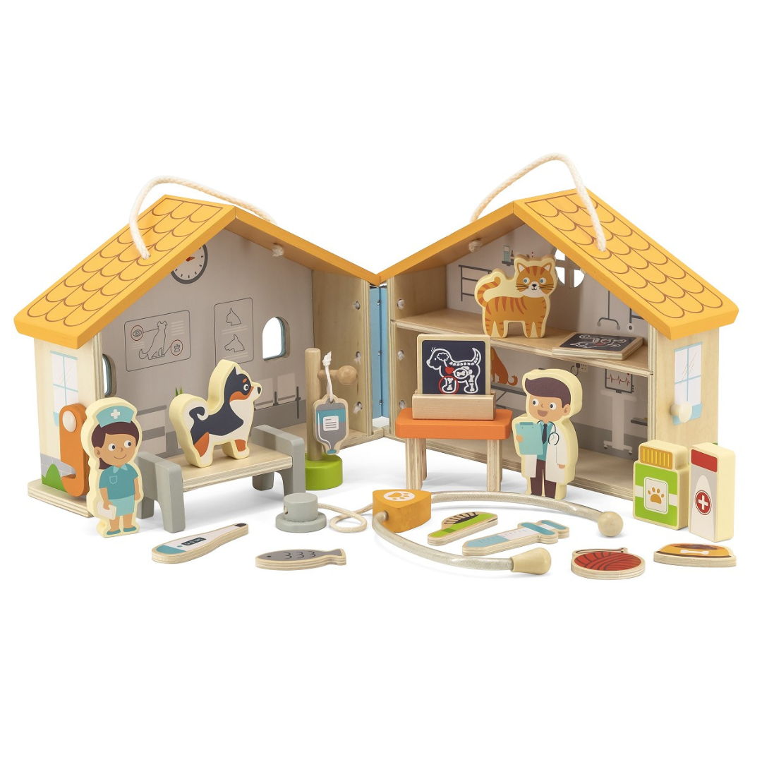 Brinquedo de clínica veterinária de madeira com casinha amarela e figuras de animais e médicos.