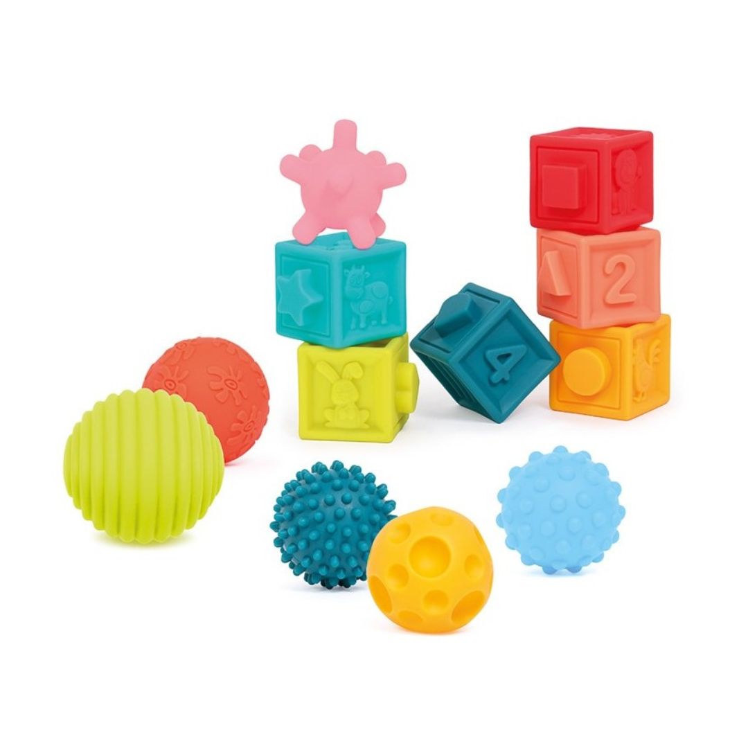 Conjunto de blocos e bolas sensoriais coloridos com texturas variadas