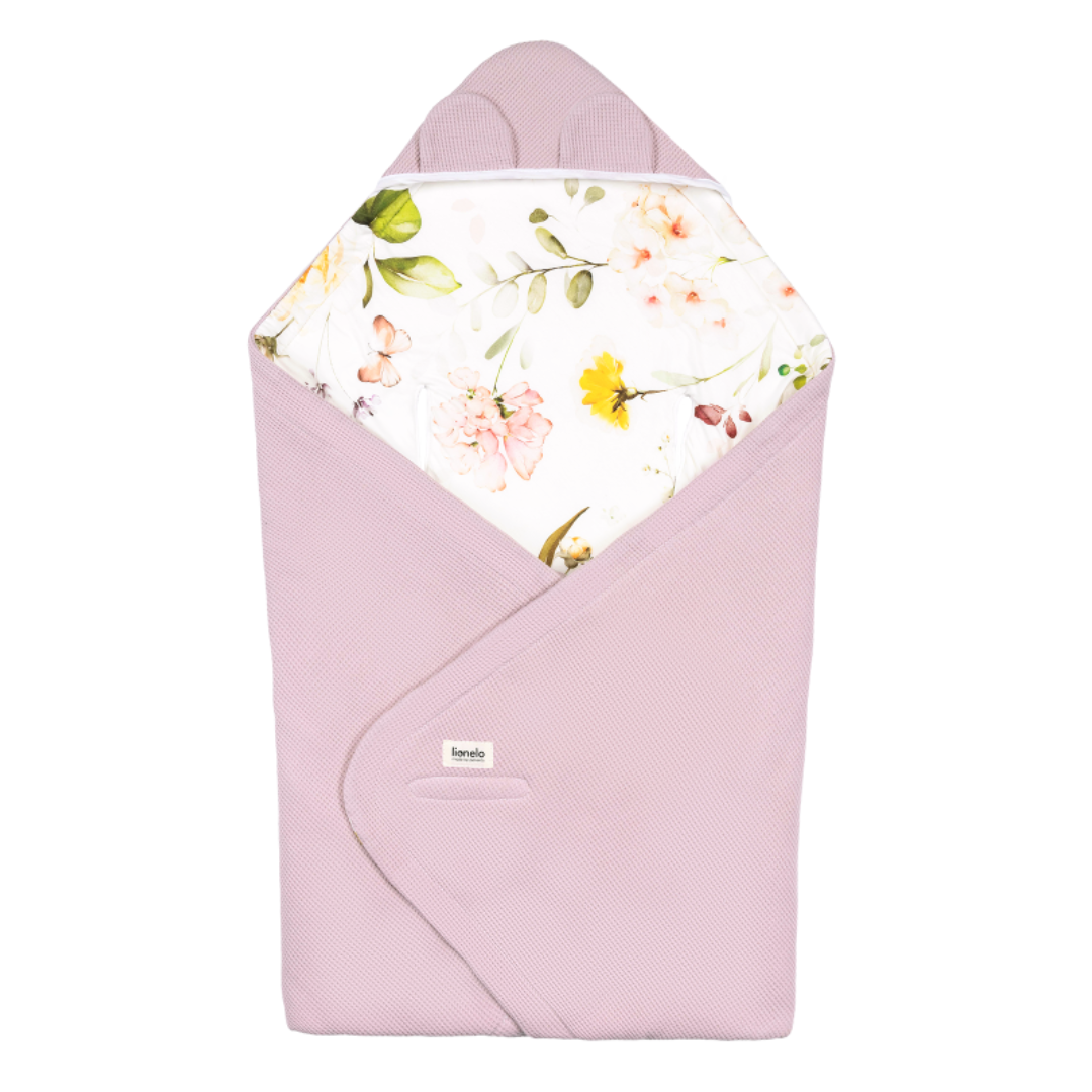 Saco de bebé rosa com interior floral e etiqueta 'beeeco'