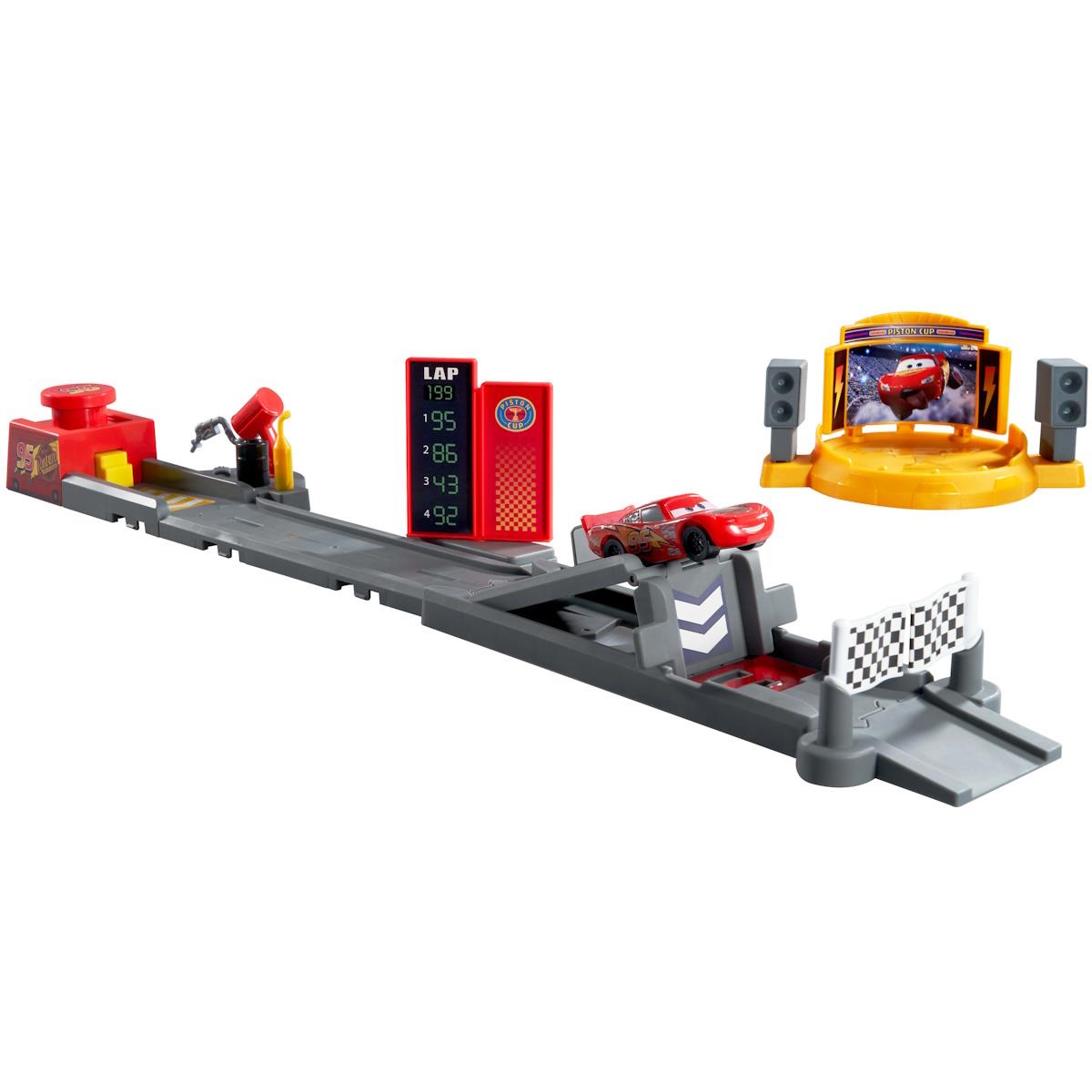 Brinquedo pista corrida com carro vermelho, painel digital LAP, bandeiras xadrez e base amarela com ecrã