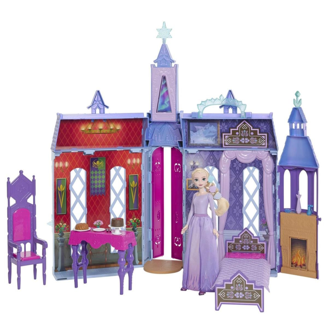 Castelo de brinquedo com boneca e mobília em vidro