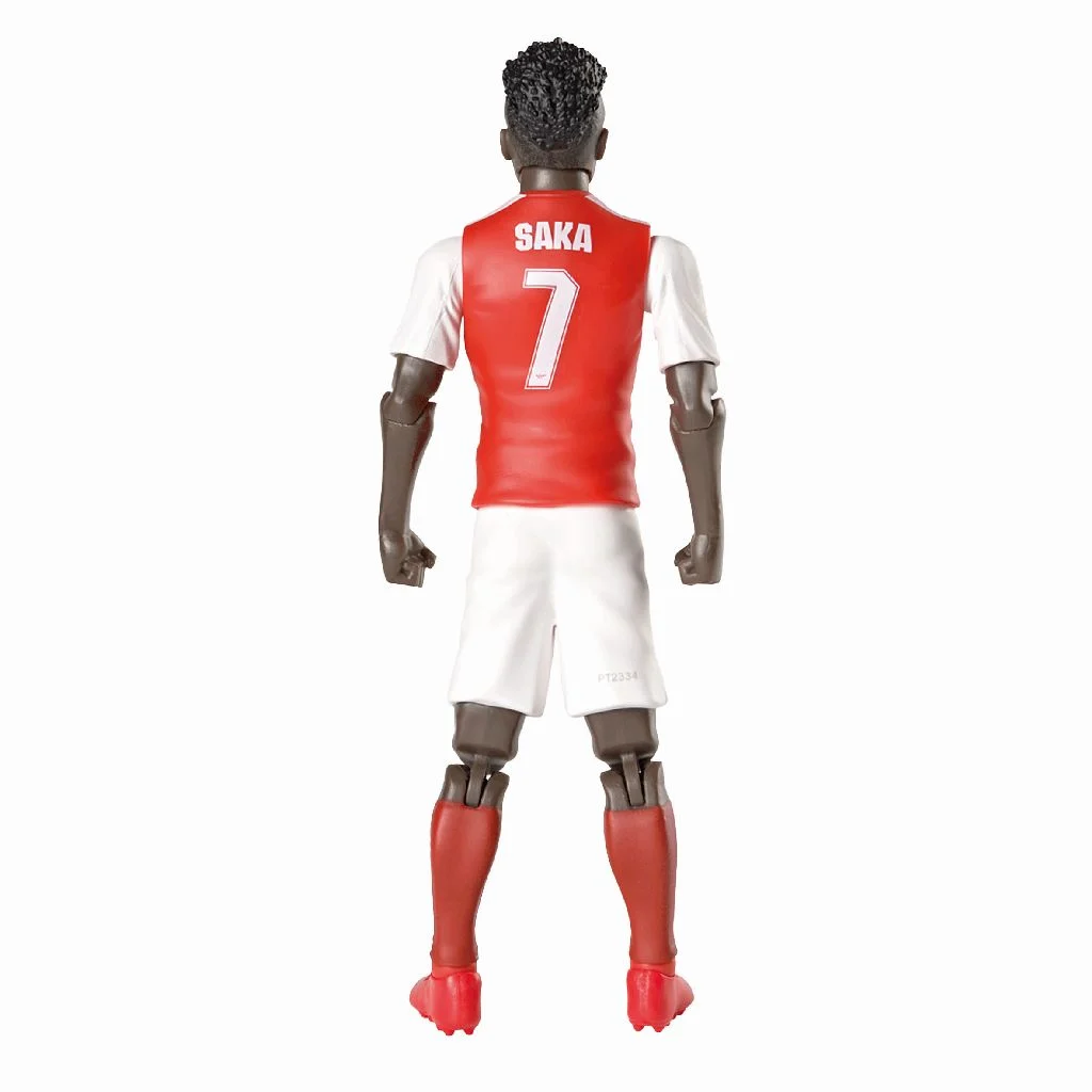 Figura de ação de jogador de futebol vestindo camisola vermelha e branca com nome SAKA e número 7