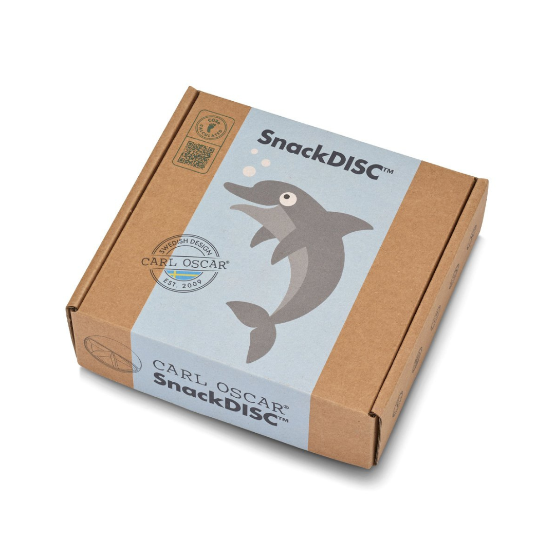 Caixa de papelão castanho com rótulo azul claro e golfinho, texto SnackDISC™