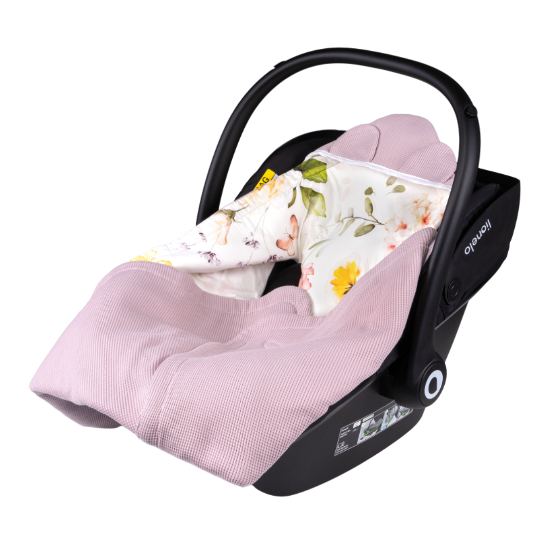 Alcofa preta para bebé com tecido rosa e forro floral colorido