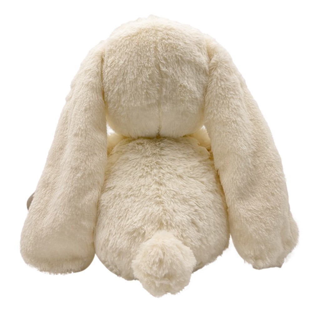 Urso de peluche creme visto de costas com orelhas compridas.