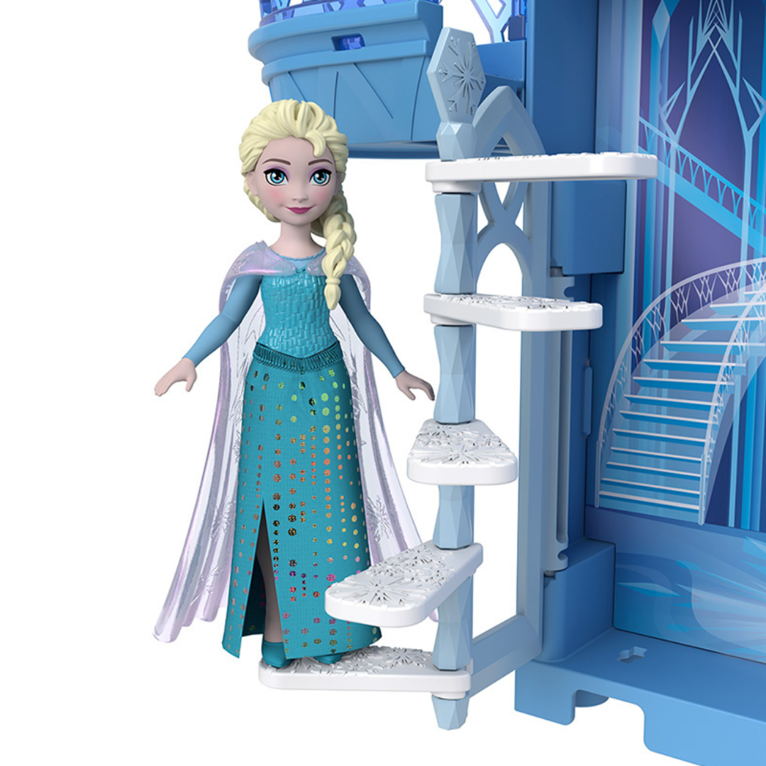 Boneca Elsa com vestido azul e escada espiral branca de plástico em castelo azul de brinquedo