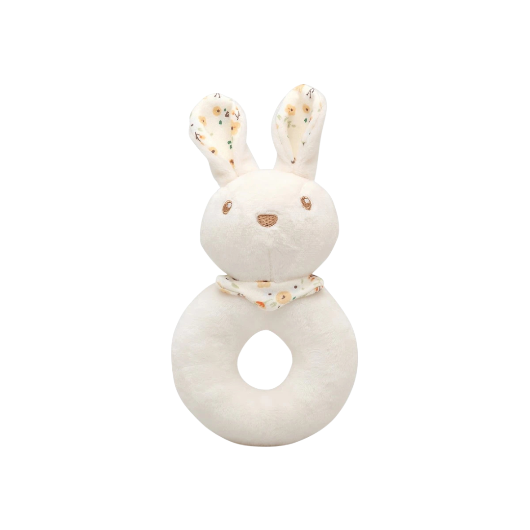 Brinquedo de peluche em forma de coelho branco com lenço floral.