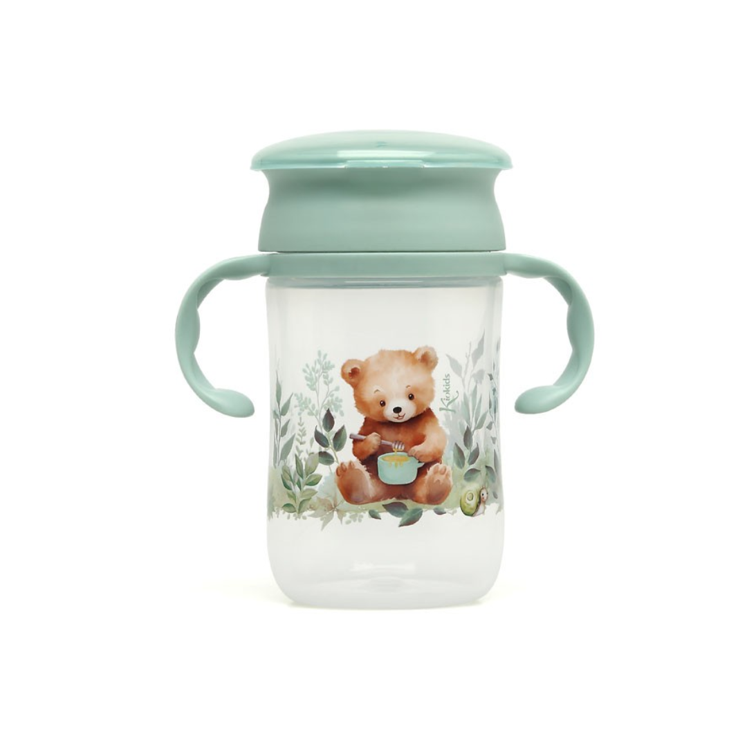 Copo infantil transparente com tampa e alças verdes e ilustração de urso