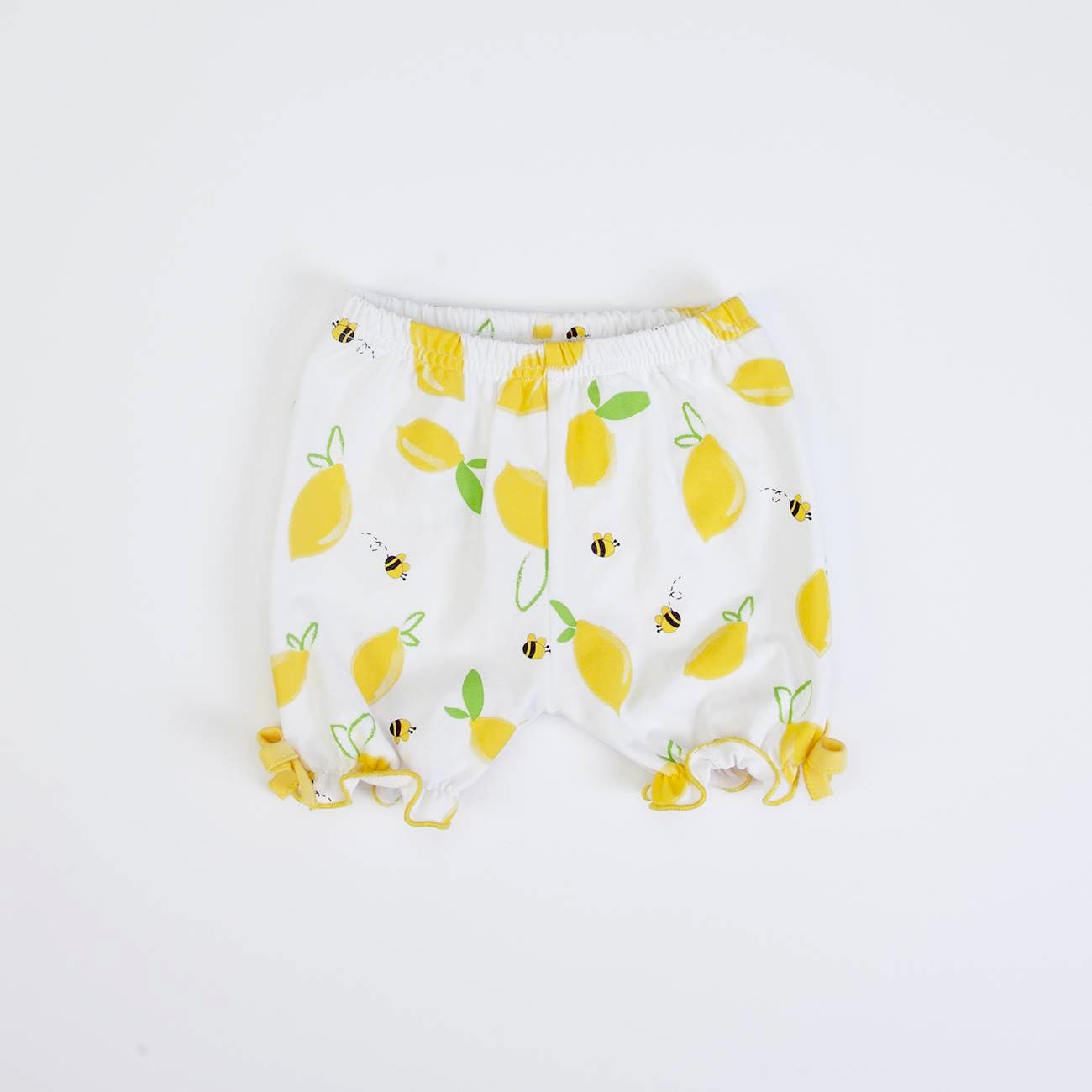 Calções de bebé brancos com estampa de limões e abelhas