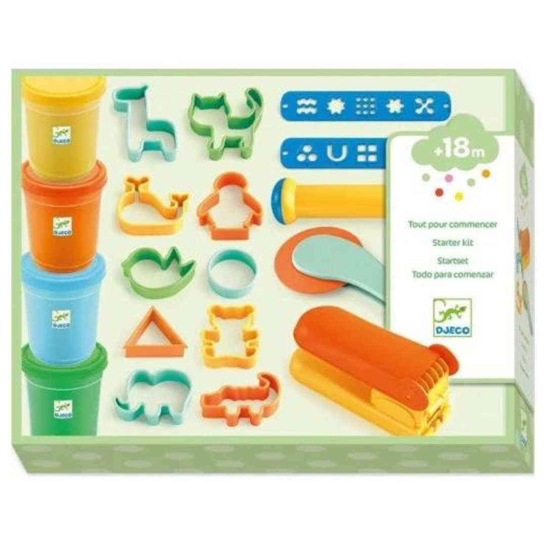 Conjunto de massa colorida com formas plásticas e ferramentas em caixa