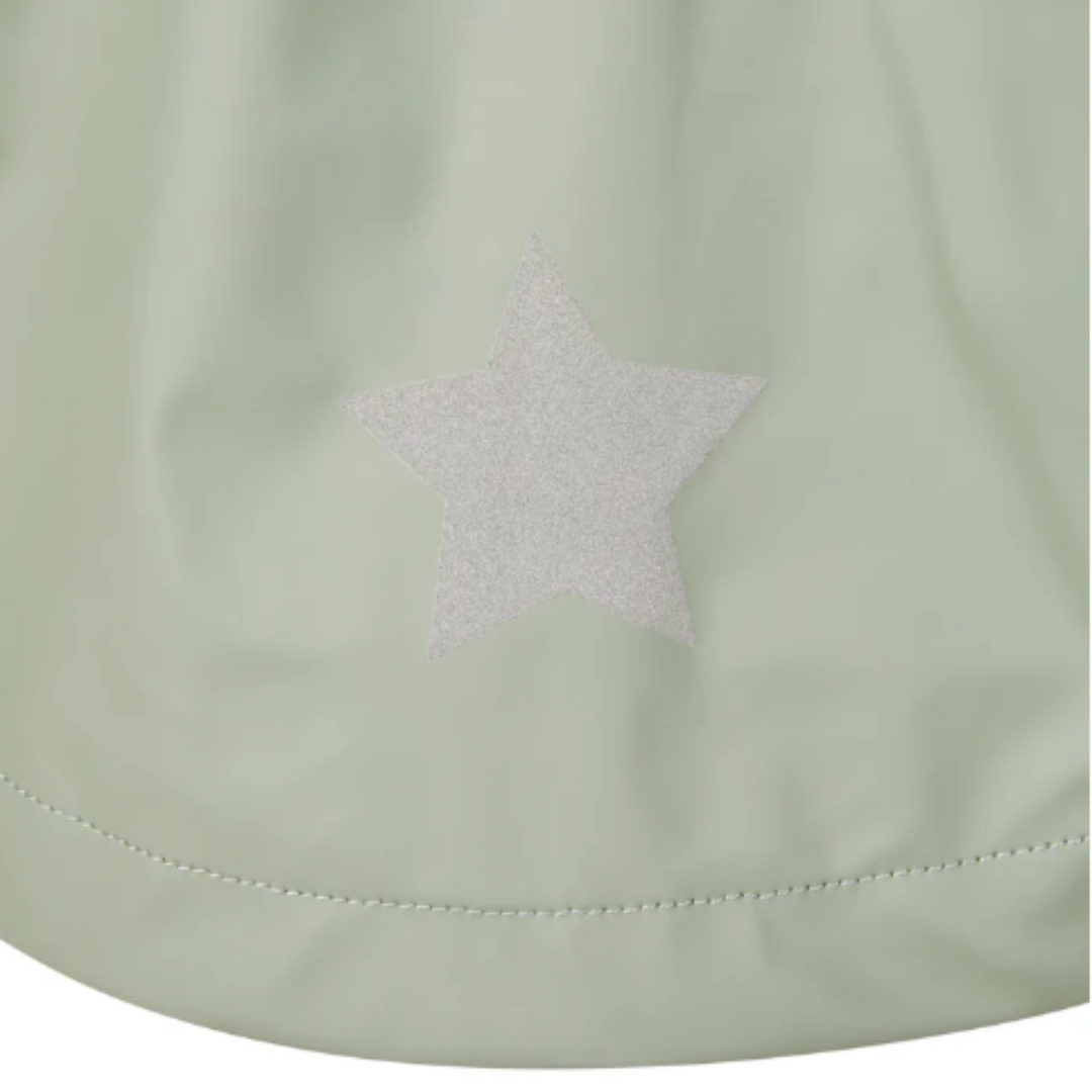 Tecido verde água com estrela prateada e costura