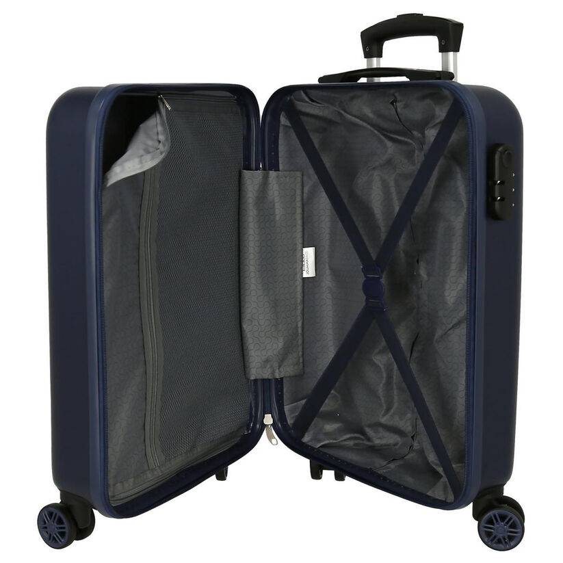 Mala de viagem rígida azul escura aberta com interior cinza e quatro rodas