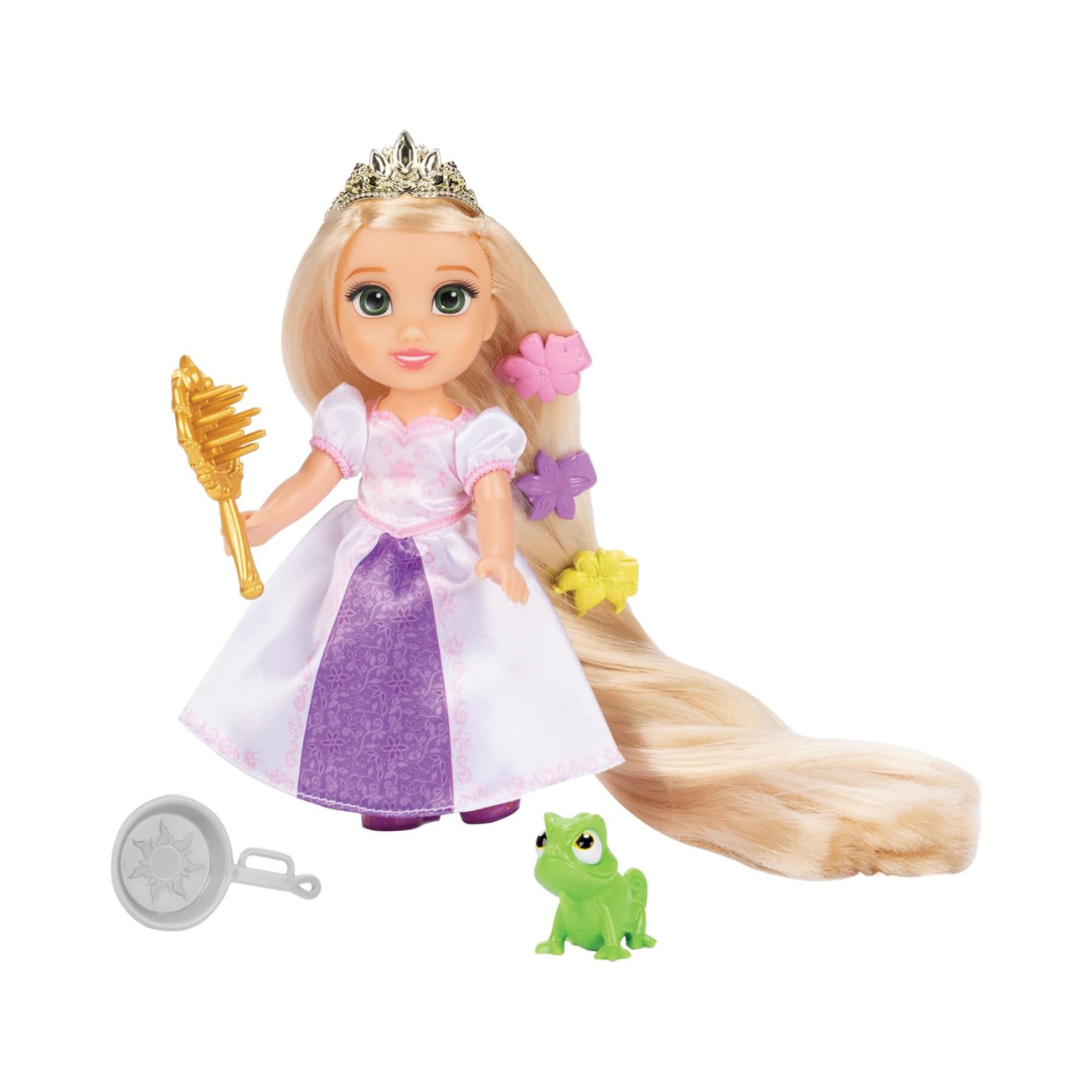 Boneca princesa com vestido branco e púrpura, coroa dourada e cabelo longo loiro.