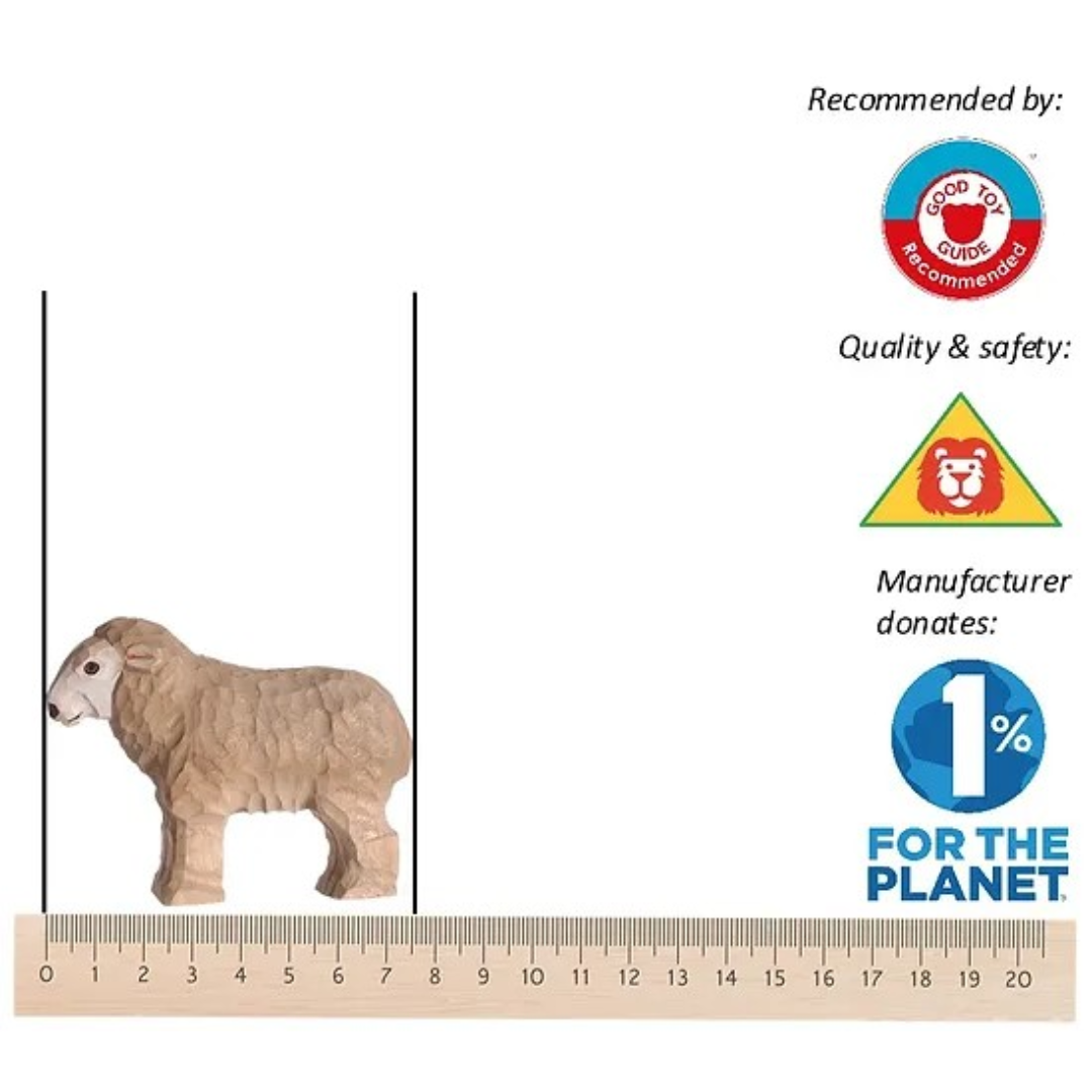 Estatueta de ovelha castanha sobre régua com selos de recomendação e sustentabilidade