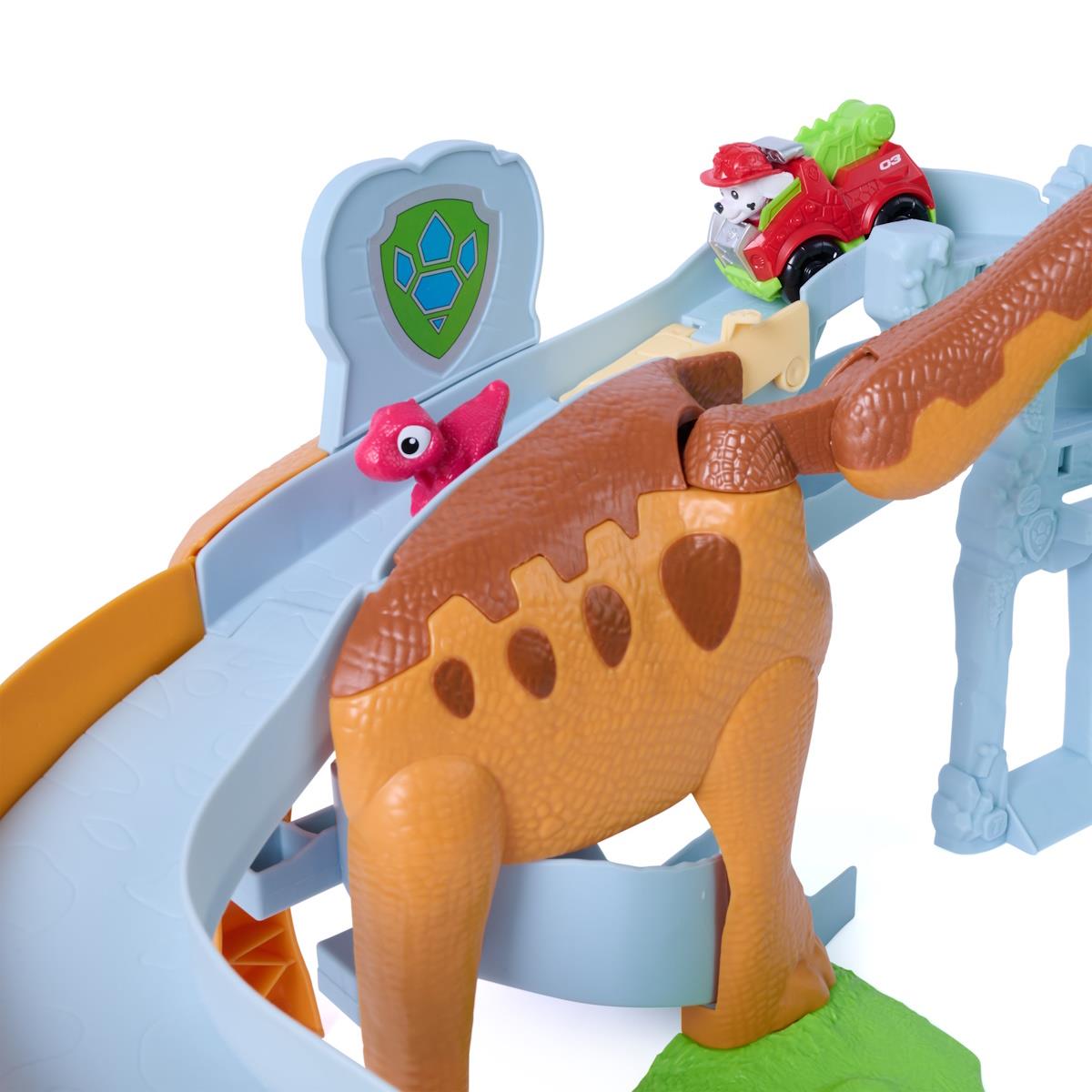 Brinquedo infantil com dinossauro e carrinho vermelho numa pista azul