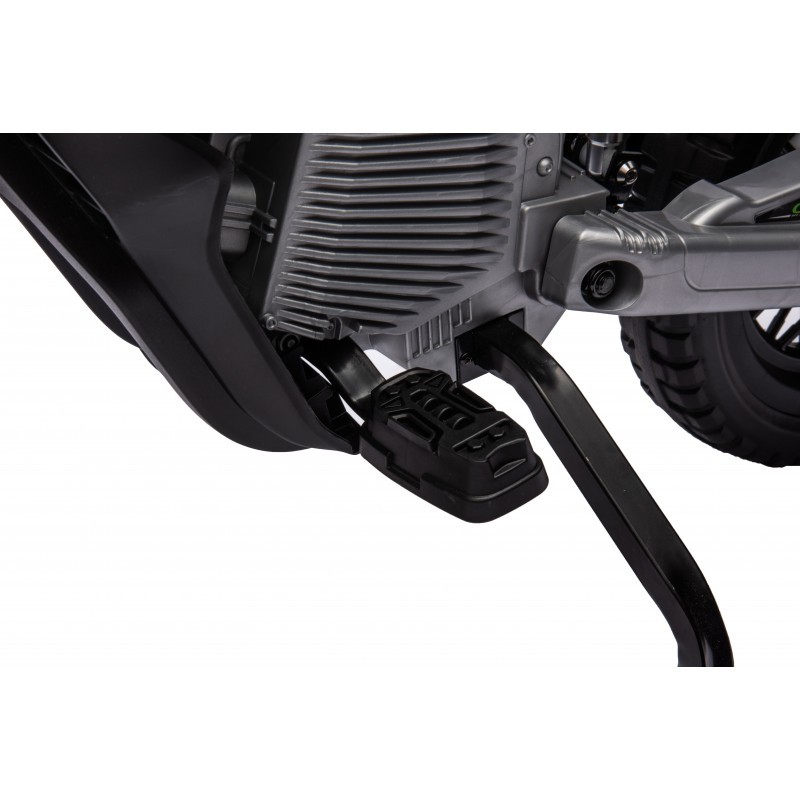 Peça de motorizada com pedal e suporte lateral preto e cinza
