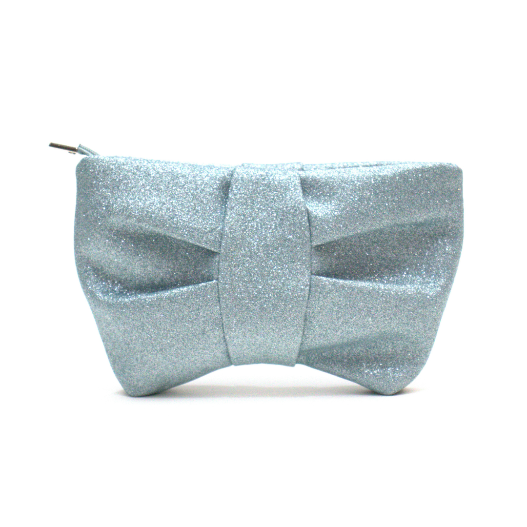 Bolsa de mão prateada brilhante em forma de laço