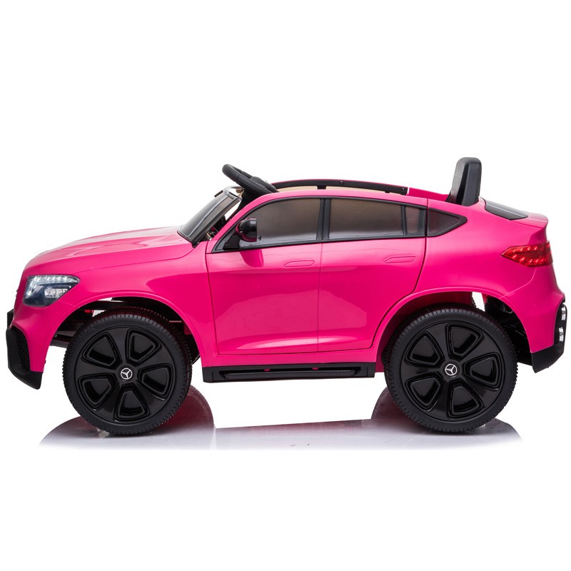 Carro de brincar elétrico cor de rosa com rodas grandes pretas