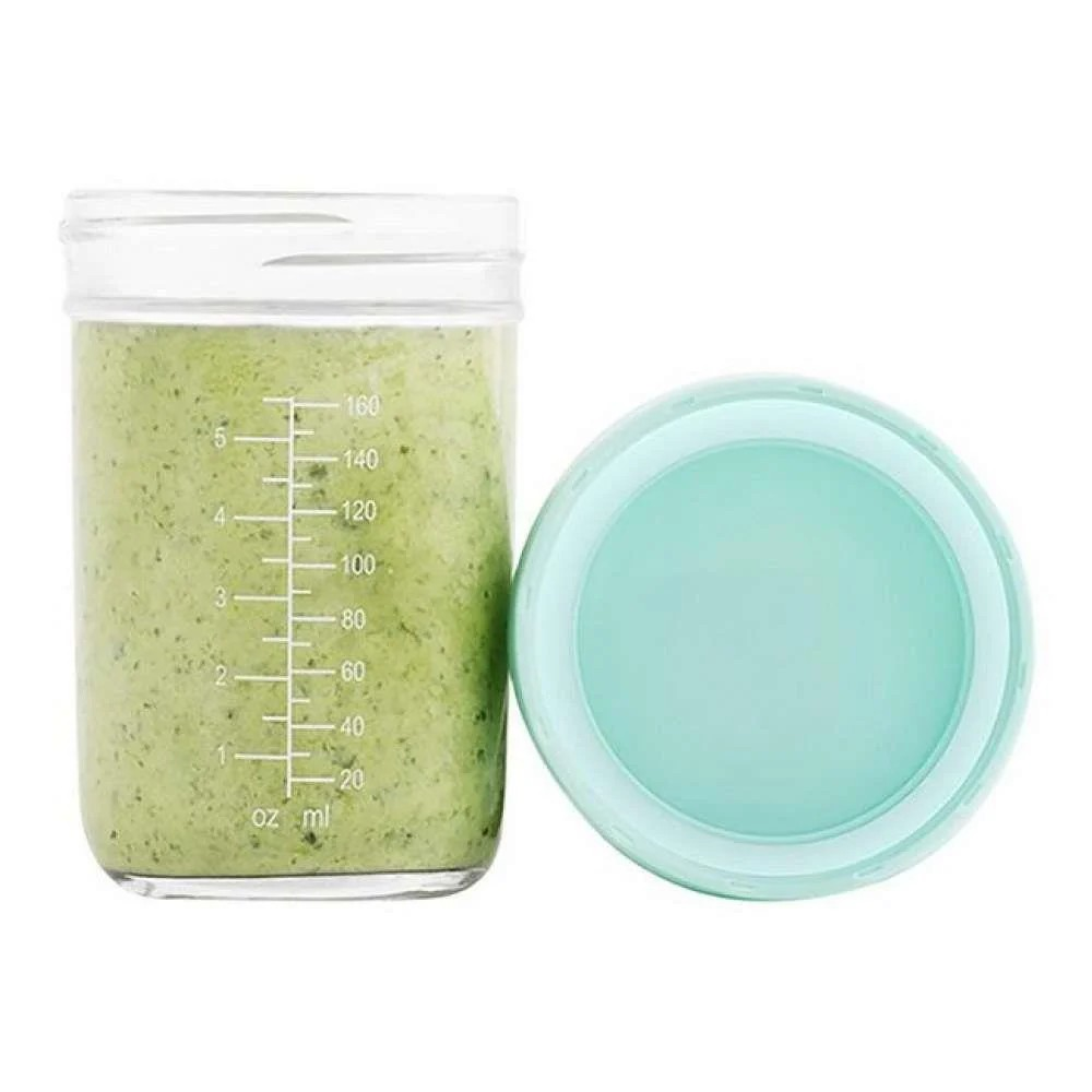 Frasco transparente com tampa azul-claro e conteúdo verde