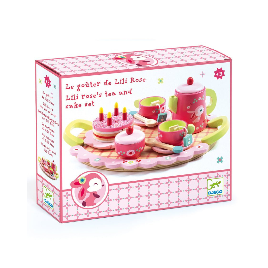 Conjunto de chá e bolo de madeira rosa e verde com embalagem com texto em francês e inglês.