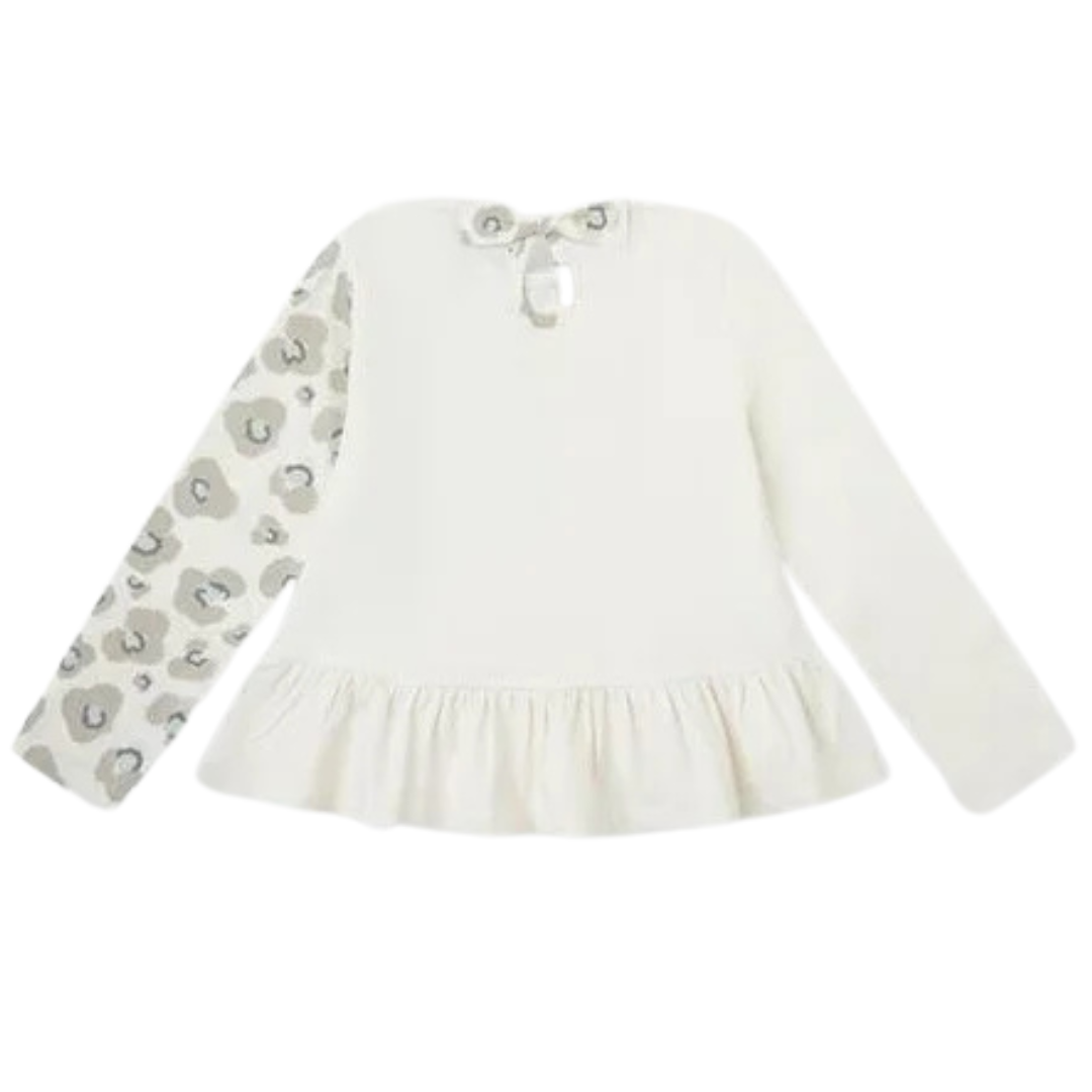 Camisola branca de malha para criança com padrão floral cinzento numa manga e saia franzida