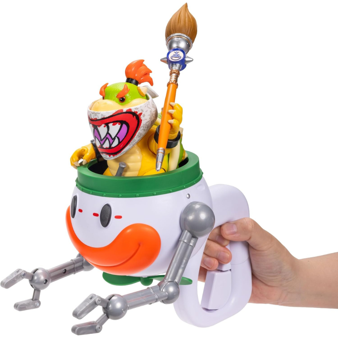 Brinquedo Bowser em veículo com braços robóticos e sorriso na frente