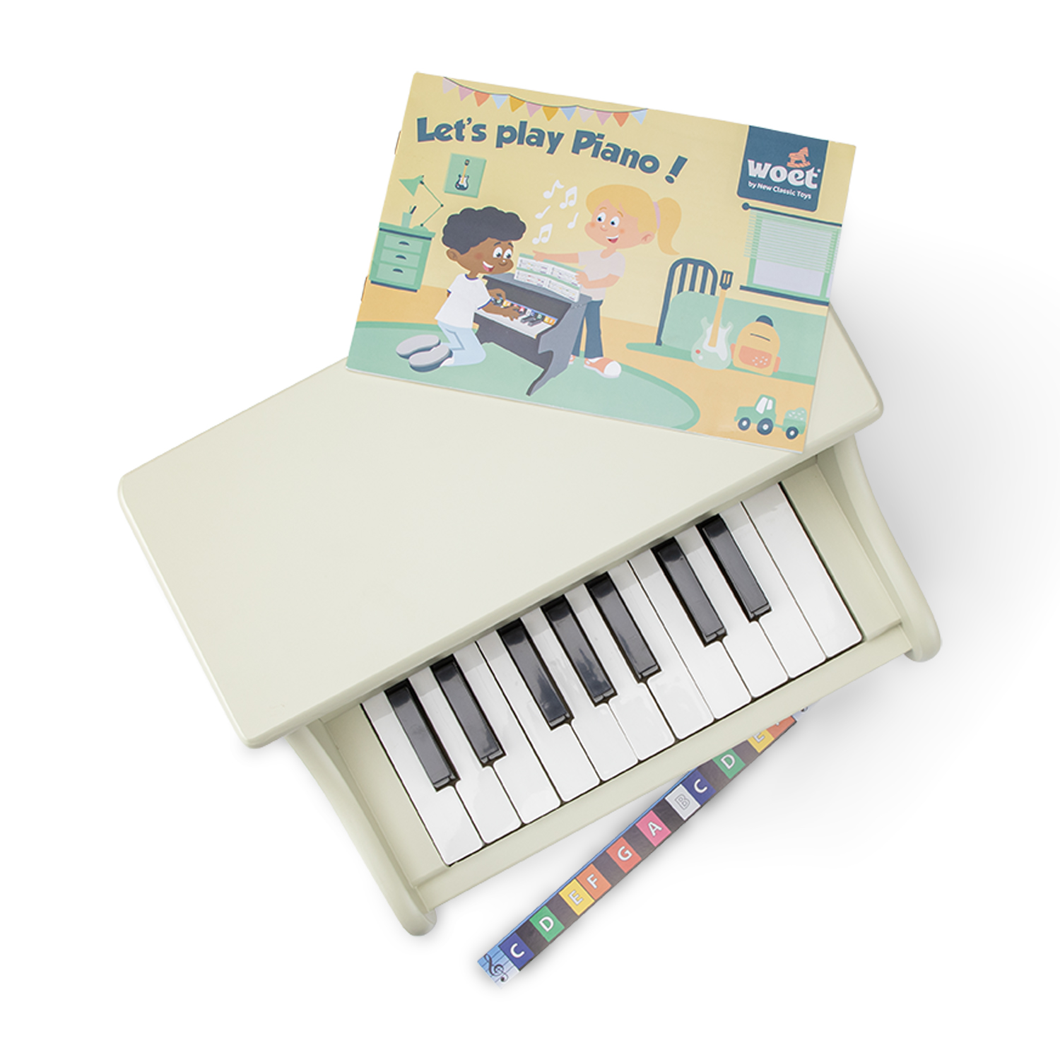 Mini piano de brinquedo em plástico creme com livro ilustrado e régua colorida com notas musicais
