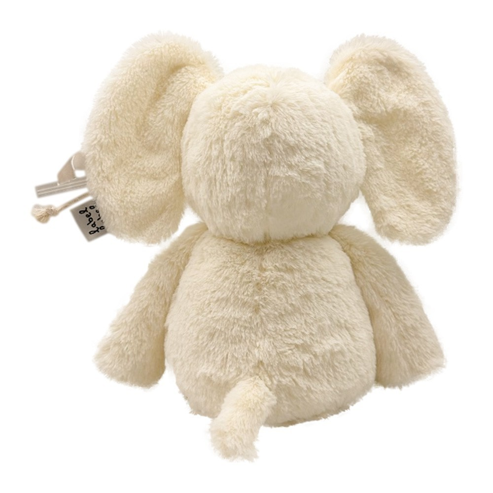 Pelúcia creme de elefante vista de costas com grandes orelhas e cauda pequena