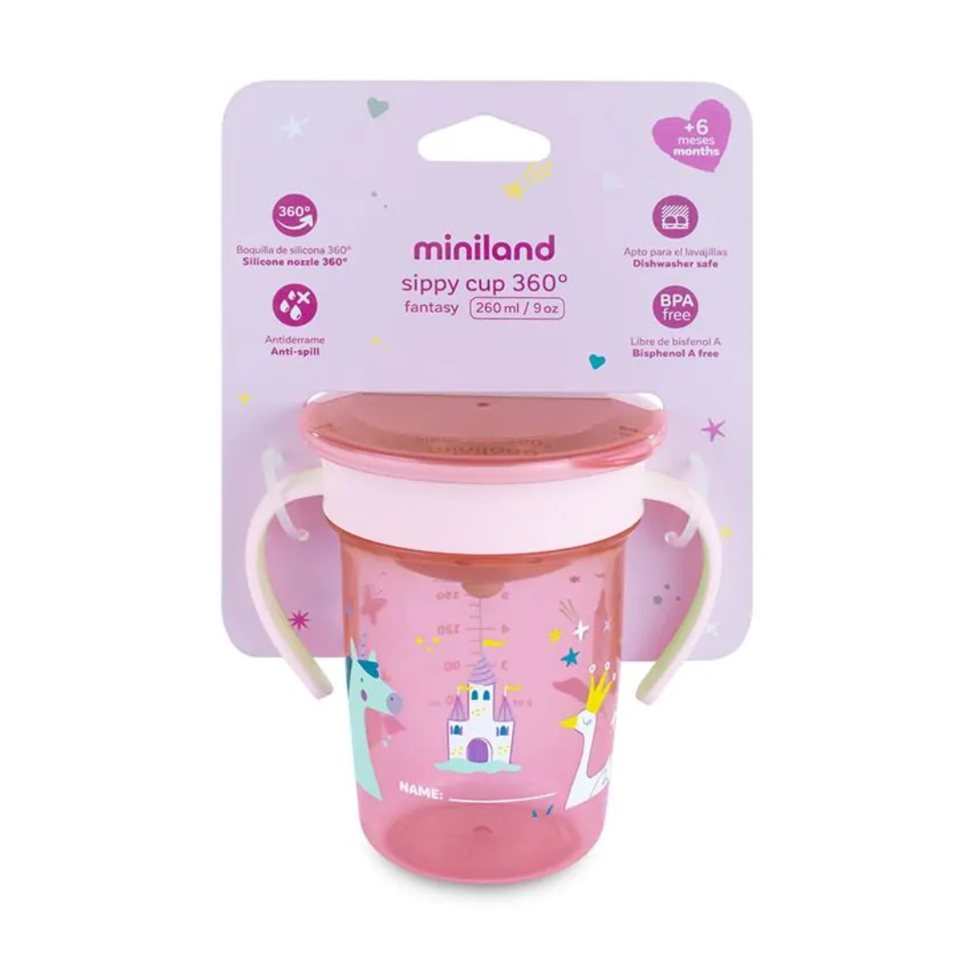 Copo de treino rosa com alças e desenho de castelo e unicórnio em embalagem roxa clara