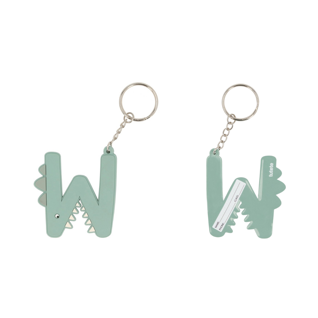 Porta-chaves verdes em forma de letra W com dentes serrilhados