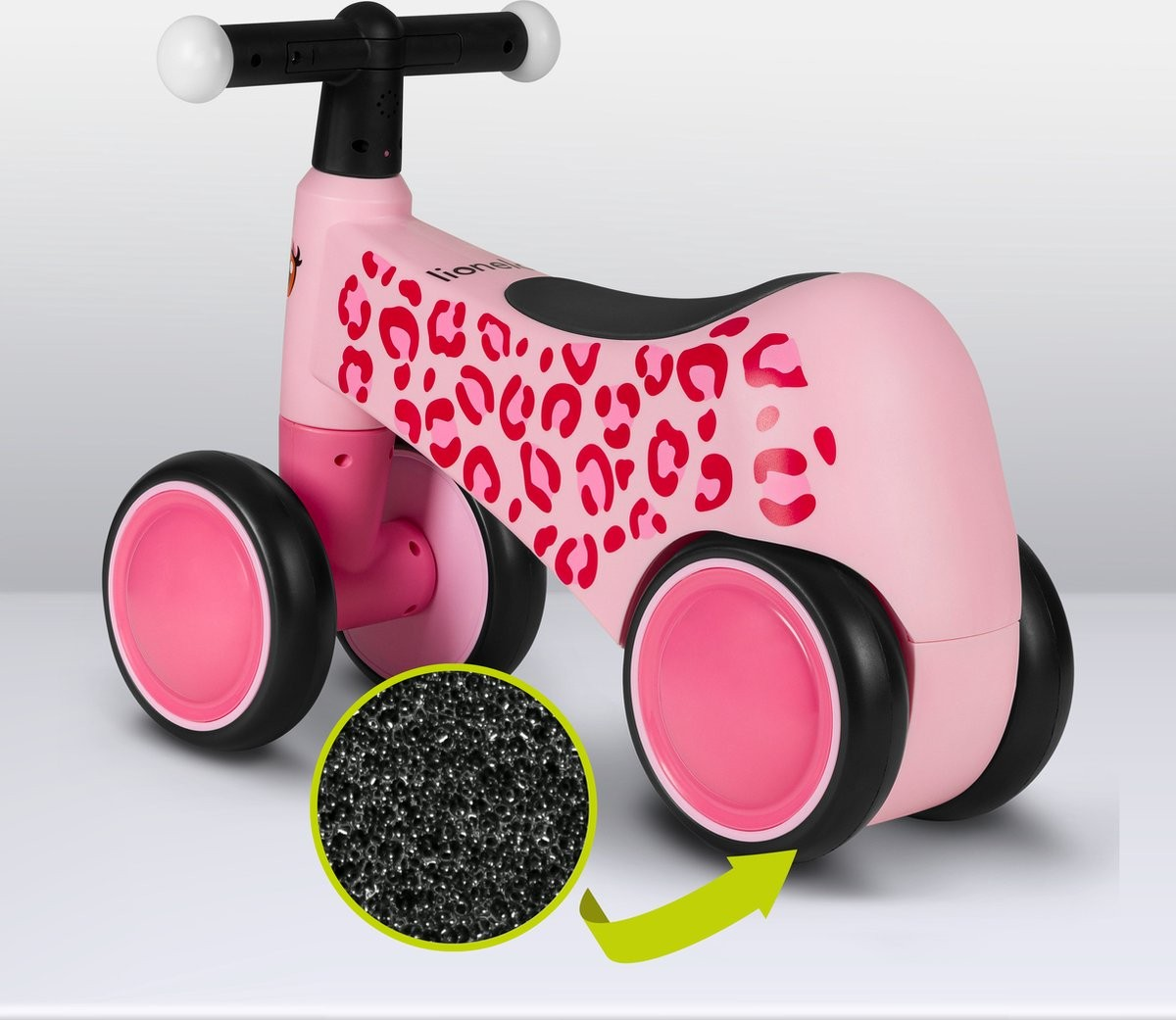 Andarilho infantil cor-de-rosa com padrão vermelho e guiador preto